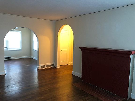 Living room to entry and dining room