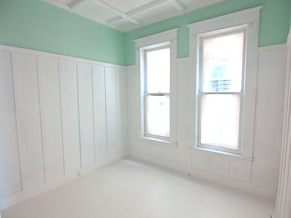 High ceilings and oversized windows Victorian style