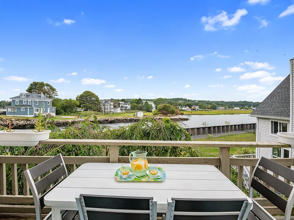 Enjoy views and meals from the private balcony overlooking the boats traveling through the channel