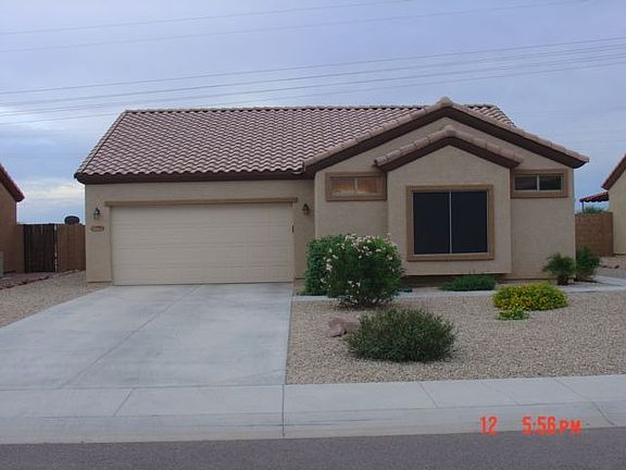 Front of Home Faces Superstition Mountains