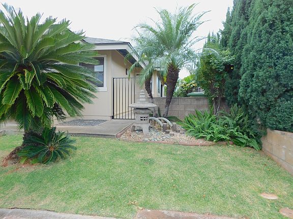 Lovely landscaping. Yard service included in rent. Auto sprinkler system.