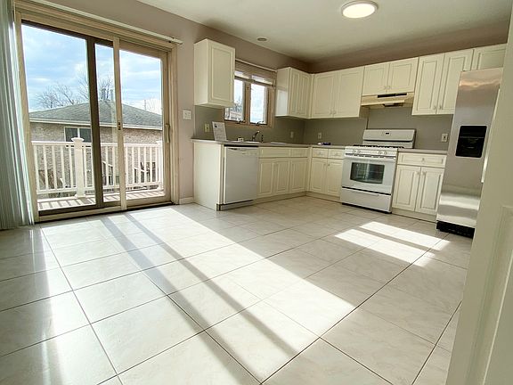 Kitchen with sliding door to deck