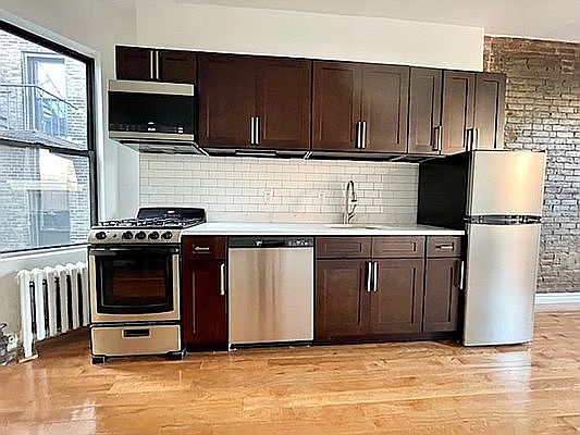 3rd image of 304 E 11th St APT 5A