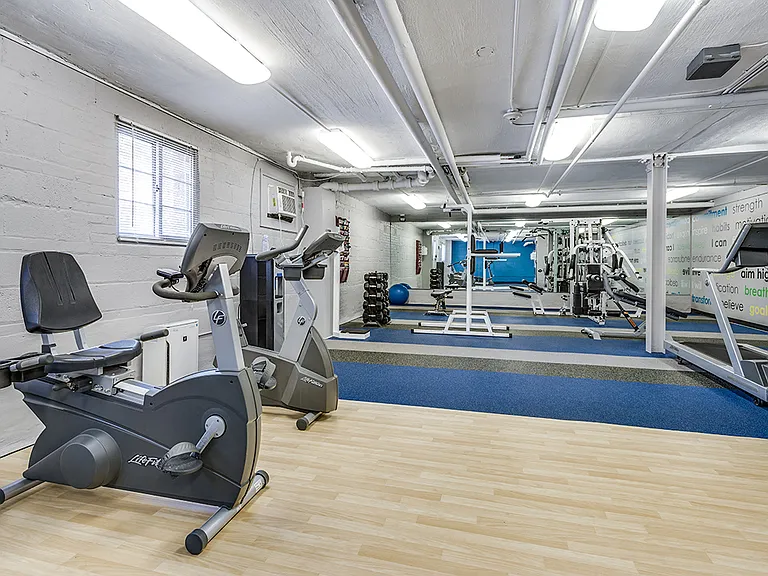 Fitness center with treadmills, machines and free weights