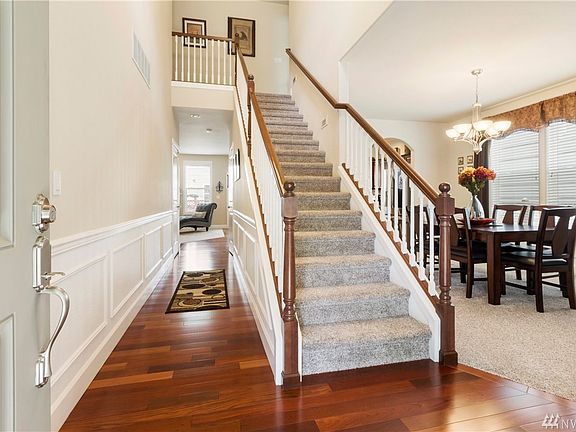 Elegant entry with Brazilian redwood flooring