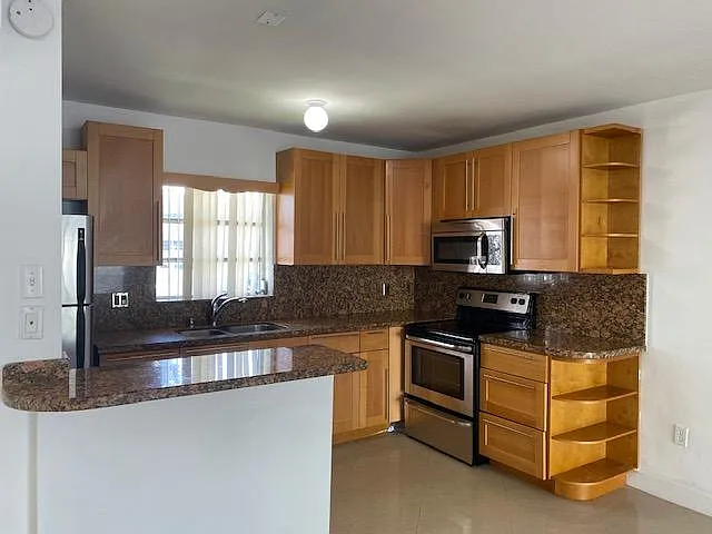 7680 SW 82nd St #121H — Photo 4