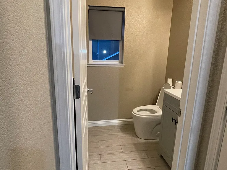 2nd Floor - half bathroom with updated vanity and toilet that is less than 4 years old