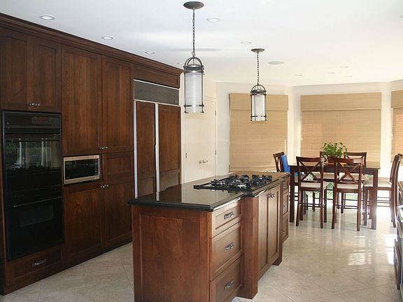 Walnut cabinets, Granite Countertop, Island, Top of the line appliances