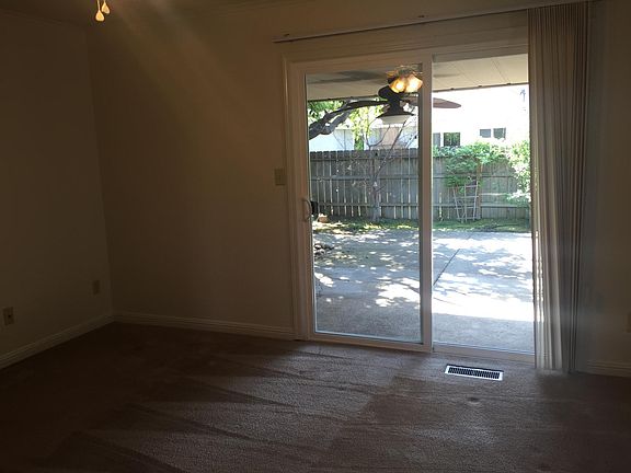 Sliders in master bedroom to covered patio