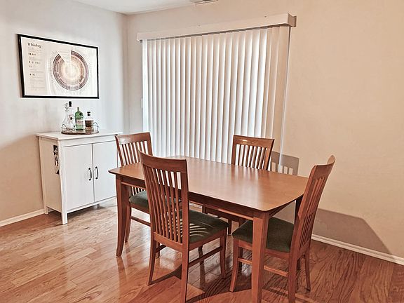 Dining area with patio access.