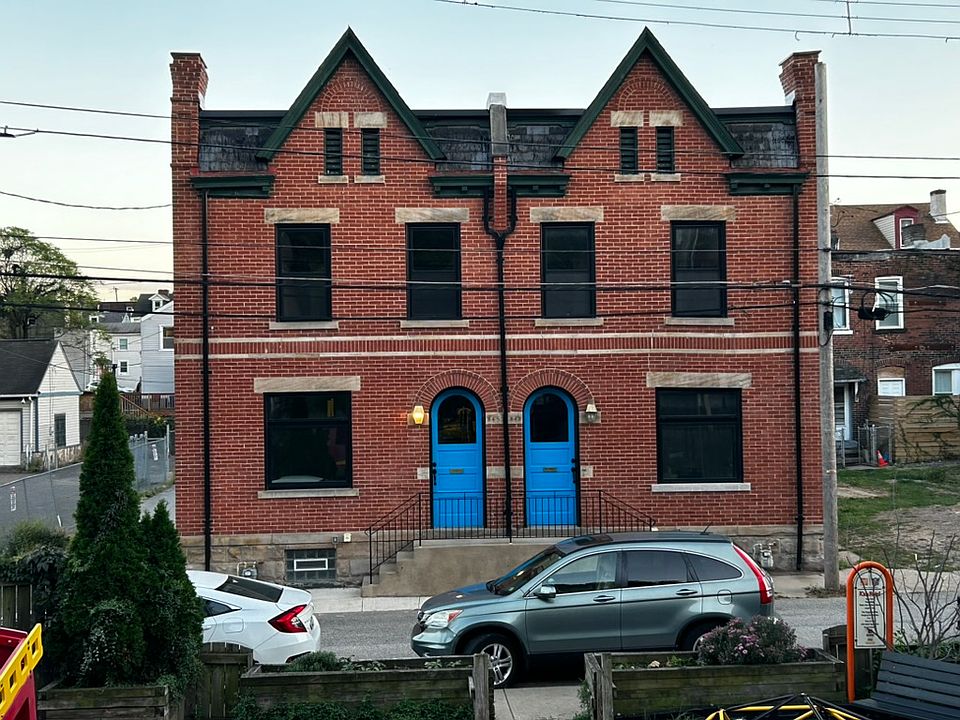 843-845 Spring Garden Avenue with childrens park in front and parking in the lot adjacent to the right