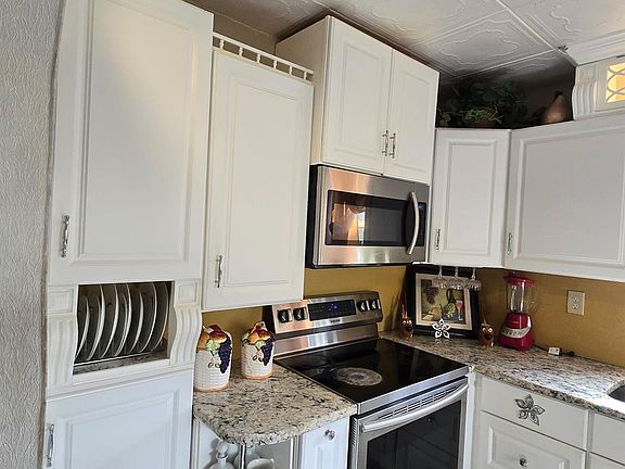 4th image of 3200 NW 5th Terrace #24