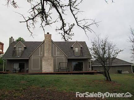 Huge family room with stone fireplace