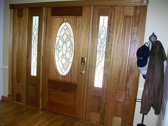 COVERED ENTRY WITH BEVELED GLASS DOOR & SIDE PANELS