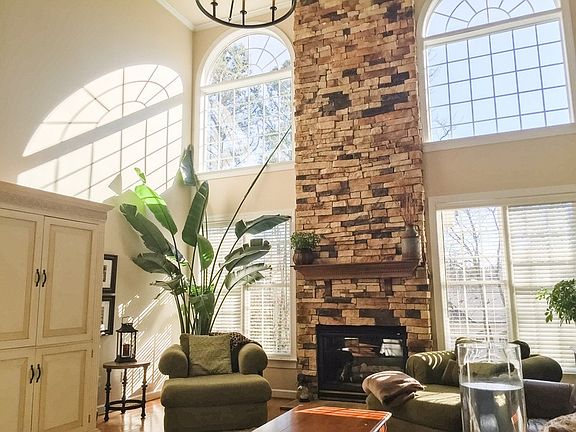 Ceiling to Floor Stack Stone Fire Place
