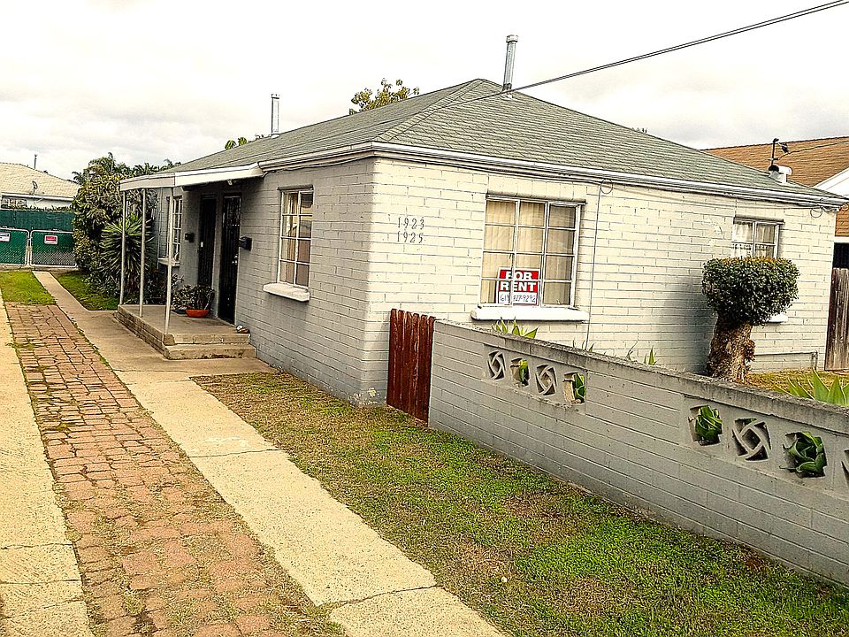 (Closest unit depicted) Photo of exterior, yard, and driveway