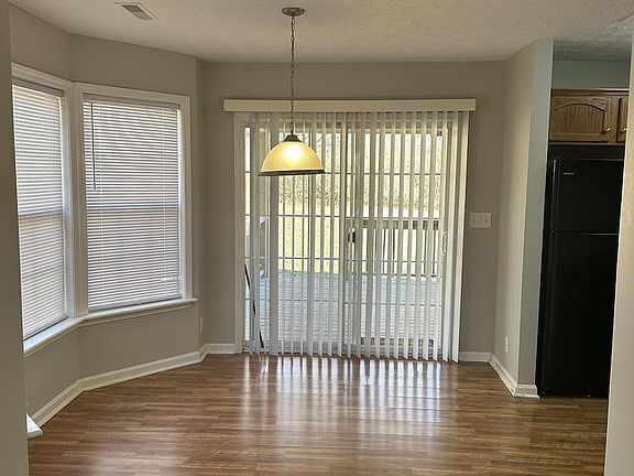 Dining room that leads out to covered back porch