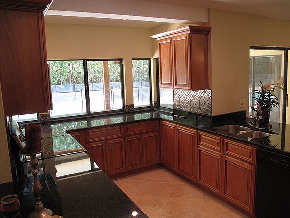 Kithcen with pass-through window to outside bar