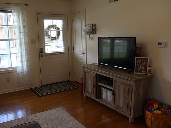 Front door, coat closet