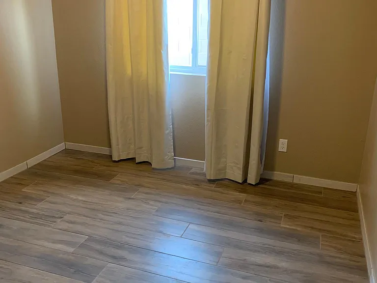 Middle room, curtains for each window included.