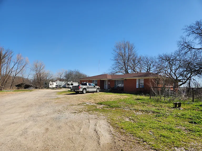 6168 County Road 988 — Photo 1