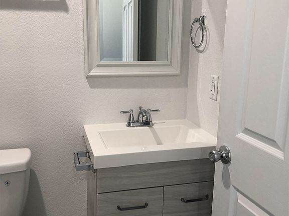 New vanity, mirror, faucets, sink,