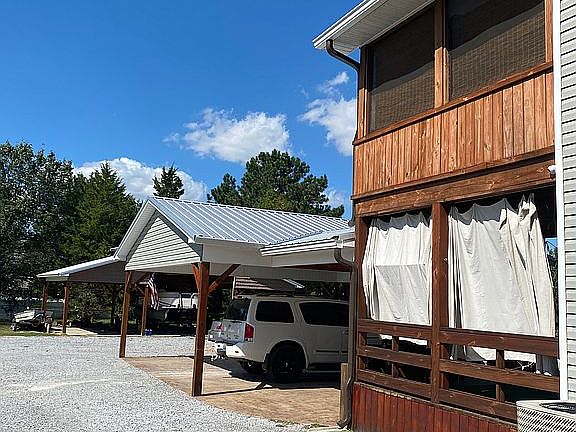 Attached carport and decks