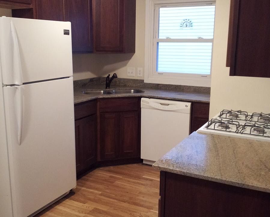 Updated Kitchen with Granite, new cabinets, and hardwood flo