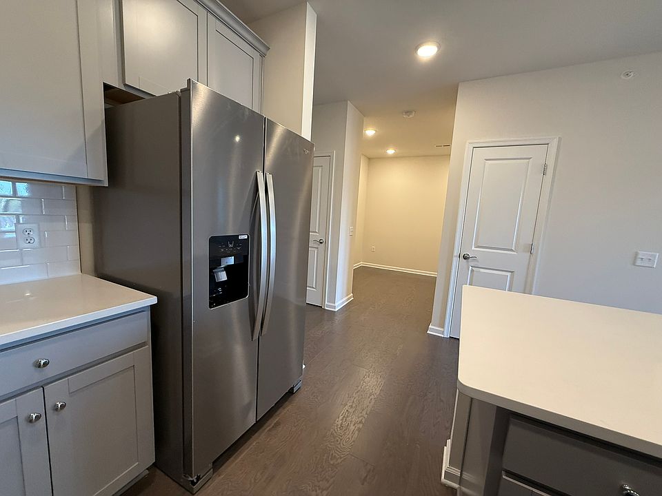Kitchen and dining room view towards far end