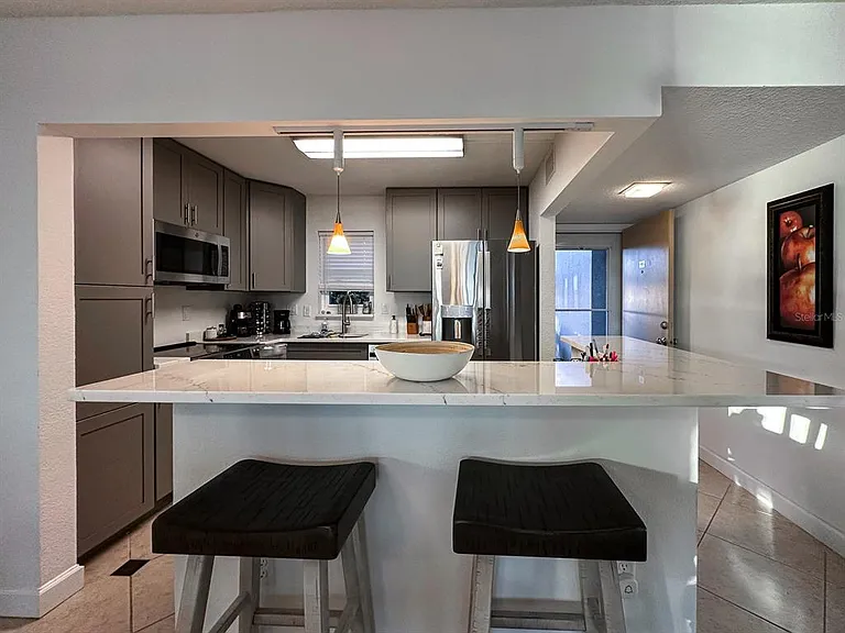 7920 Sun Island Dr S #102 — Photo 10
