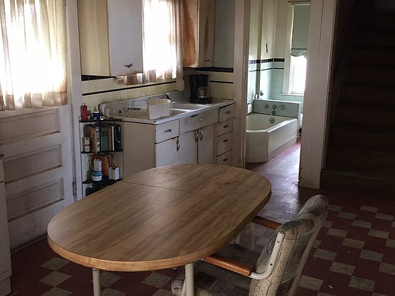 Kitchen with view of bath