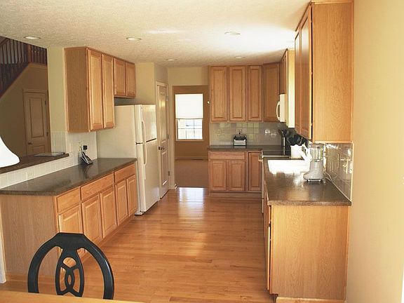 Kitchen & Eat-In Space Boasts Gorgeous Hardwood Floors