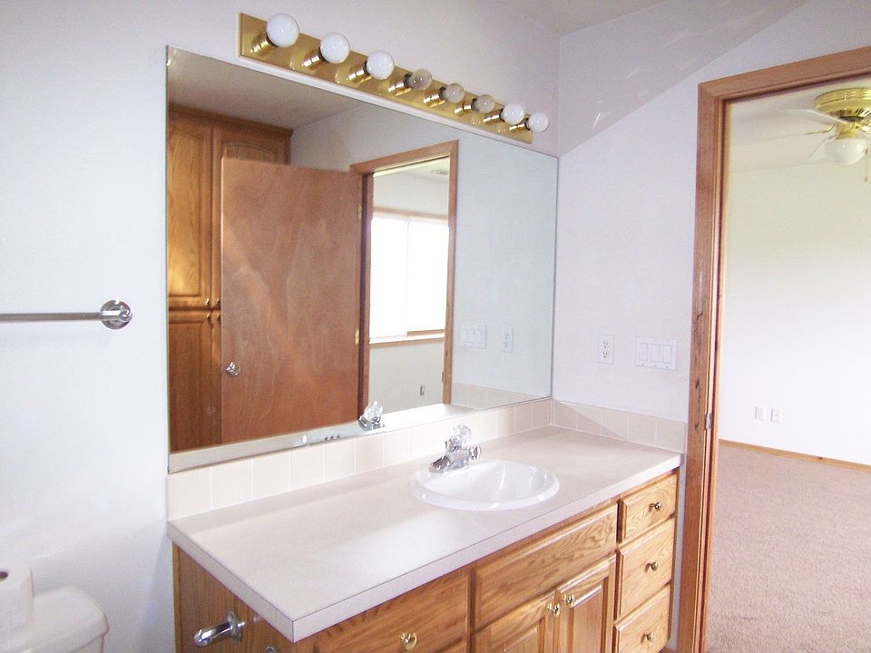 Master bathroom has shower, second full has bath