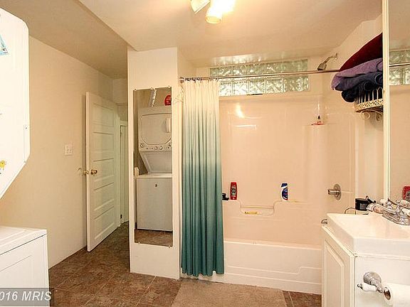 Bathroom with washer and dryer