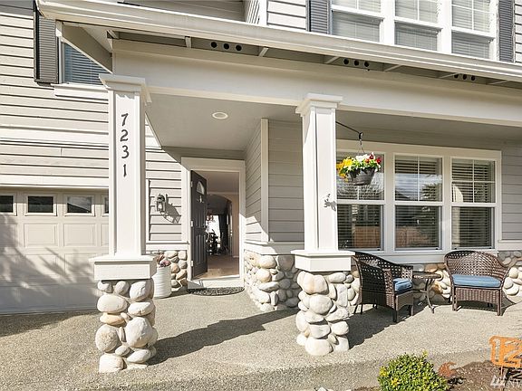 You'll enjoy the charming covered front porch.