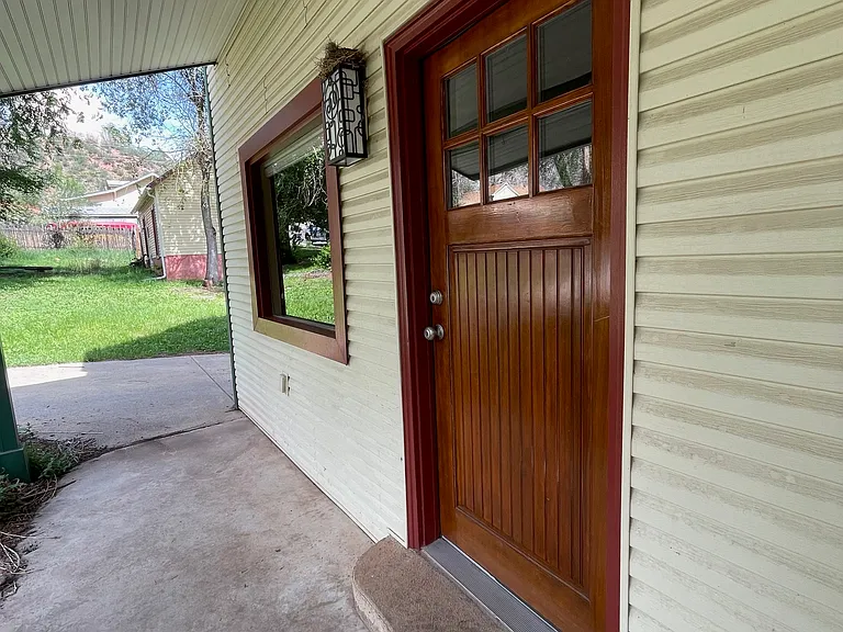 Solid wood door adds to the character and charm of this home.