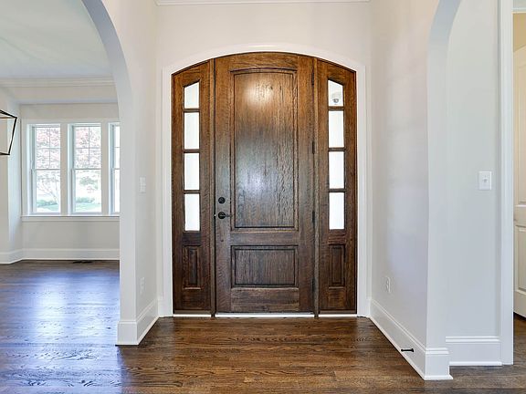 Arched entry sets the tone inside
