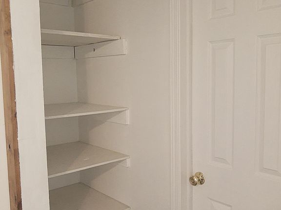 shelving in 1st bedroom