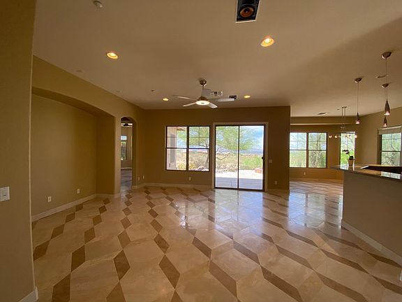 Livingroom, kitchen bar, and kitchen nook.
