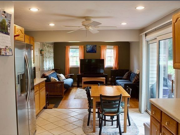 Dining area leading into the living room.