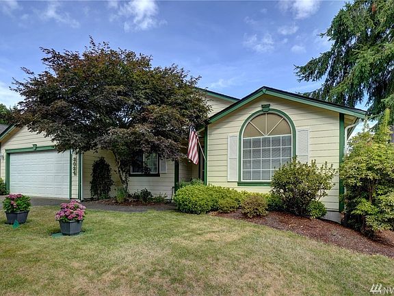 This well maintained home has tasteful landscape surrounding the home. 