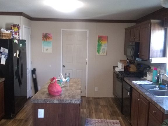 Kitchen with laundry room throughdoor