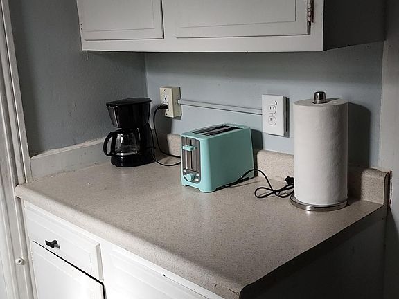 Coffee pot and Toaster included.