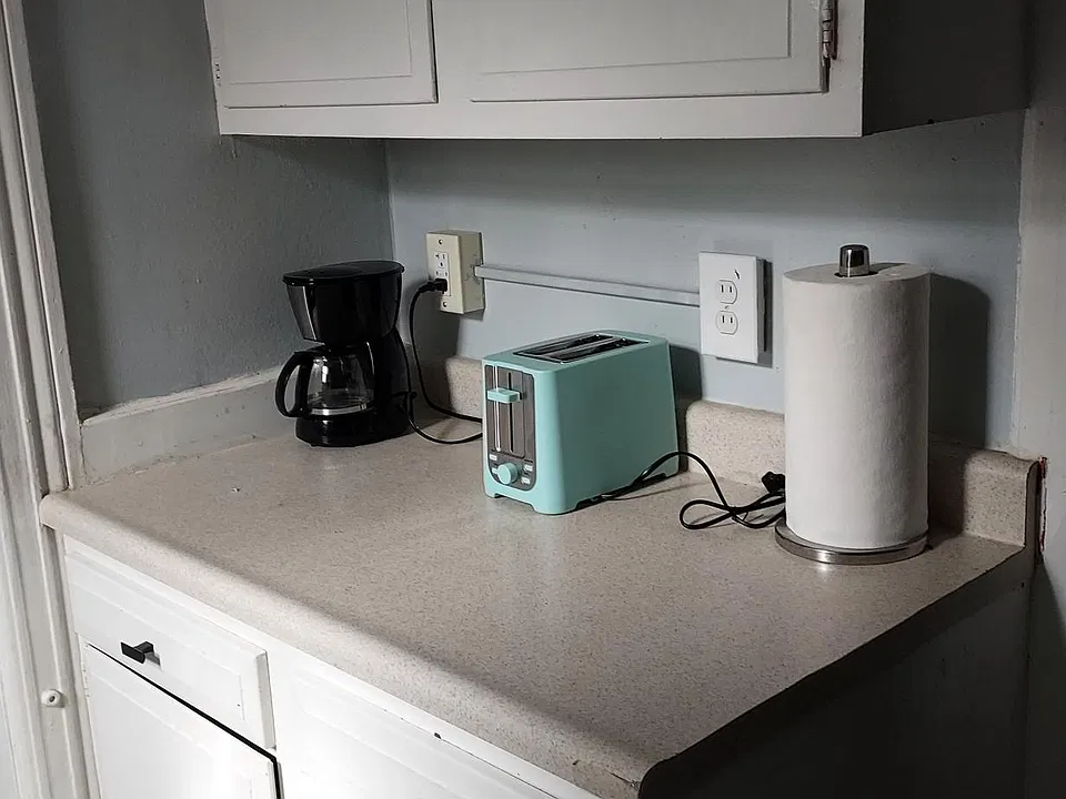 Coffee pot and Toaster included.