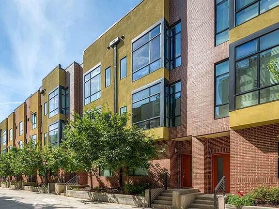 Front door and outdoor courtyard to townhome community