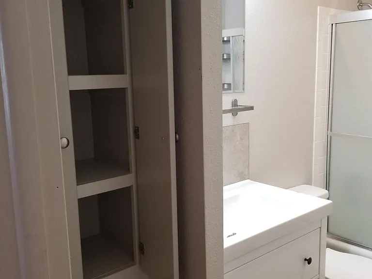 Linen closet in bathroom
