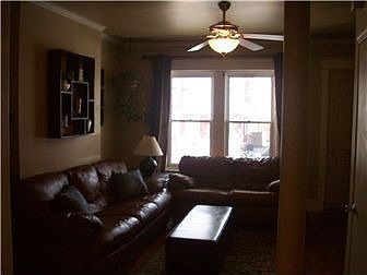 Living Room w/Refinished Hardwoods & Crown Molding
