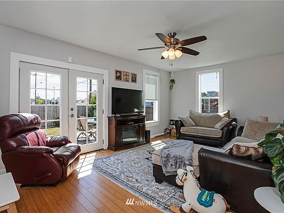 Living room with Bamboo flooring. French doors leading to the back deck. 