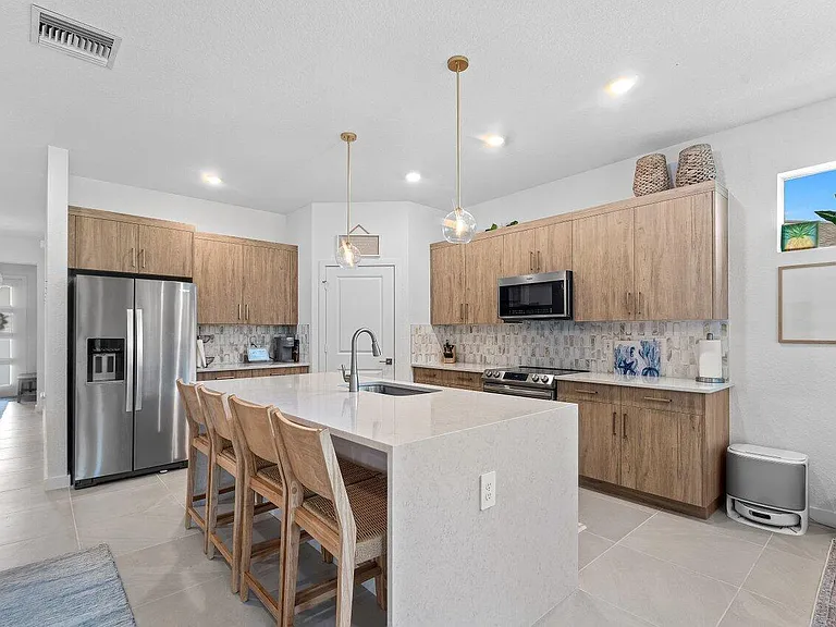 1991 NE Ocean Dunes Dr — Photo 18