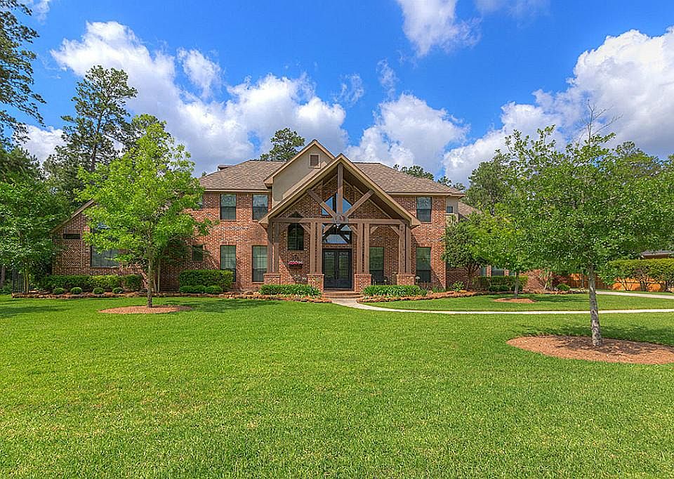 This is a Texas Dream Home! Stately 2-Story Brick Home with Front Porch Cedar Pillars & Truss.